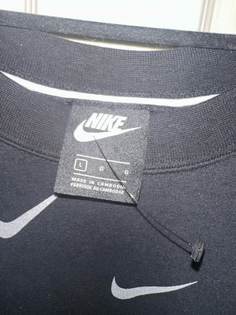 Nike Black Crewneck with Repeated White Swoosh Pattern NWOT L athleisure gym